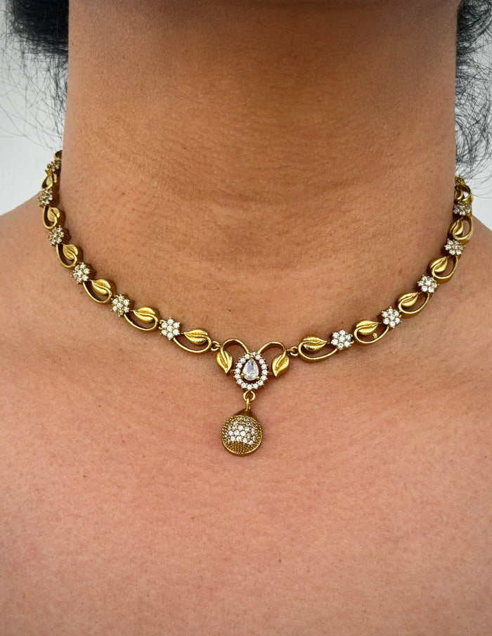 Gold necklace with a pendant