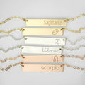 6 zodiac signs in different styles sit on a gray background. Custom name engraved bar necklace Personalized bar pendant for women Minimalist engraved bar charm necklace Custom message bar necklace Engraved bar necklace for her Personalized engraved coordinates pendant Minimalist bar necklace with custom engraving Custom bar necklace for weddings Engraved minimalist necklace for men