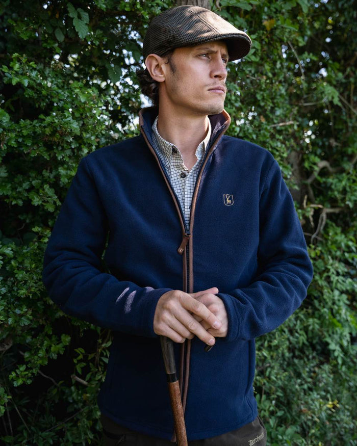 Dark Blue coloured Deerhunter Cumbria Fleece Jacket on tree background #colour_dark-blue