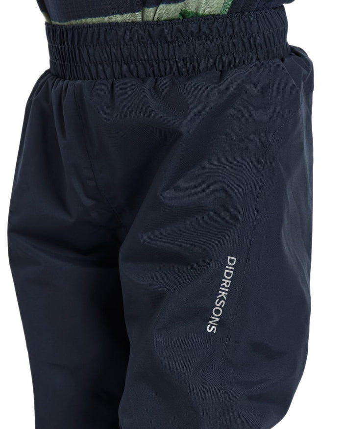 Navy coloured Didriksons Childrens Avan Pants 2 on white background #colour_navy