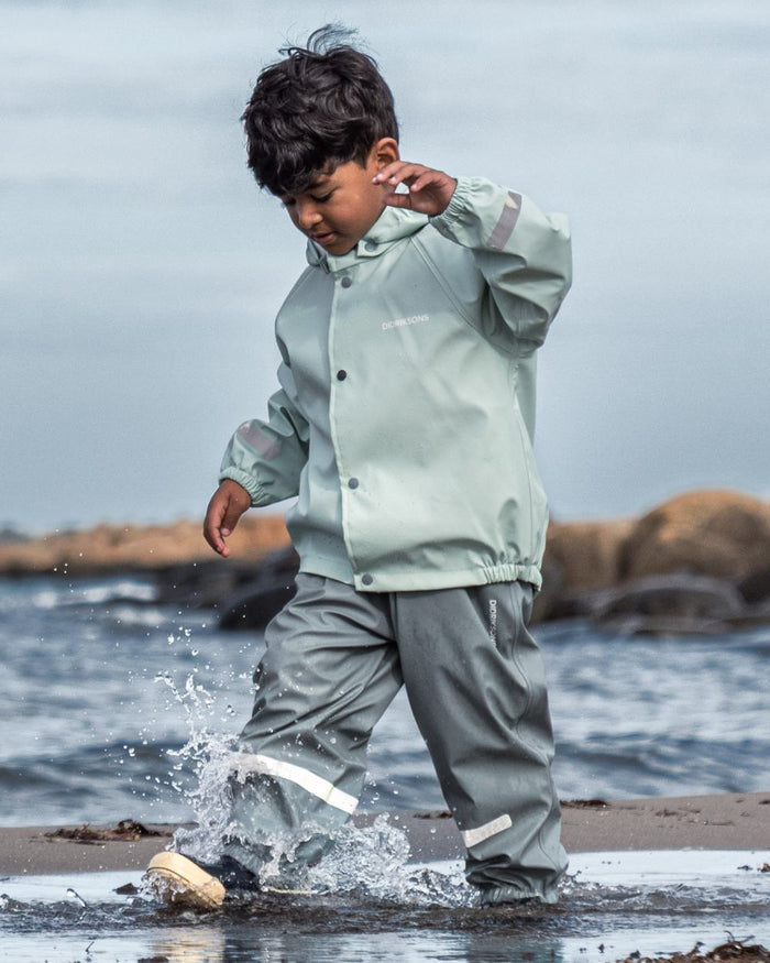 Ocean Mint coloured Didriksons Childrens Slaskeman Rain Set 2 on sea background #colour_ocean-mint