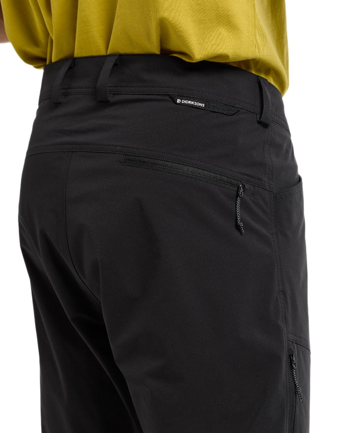 Black coloured Didriksons Mens Asher Pants on white background #colour_black