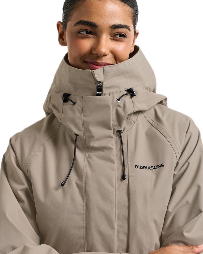 Ash Brown coloured Didriksons Womens Louise Long Parka on white background #colour_ash-brown