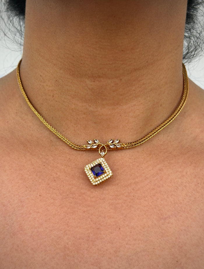 gold nelace  with blue stone
