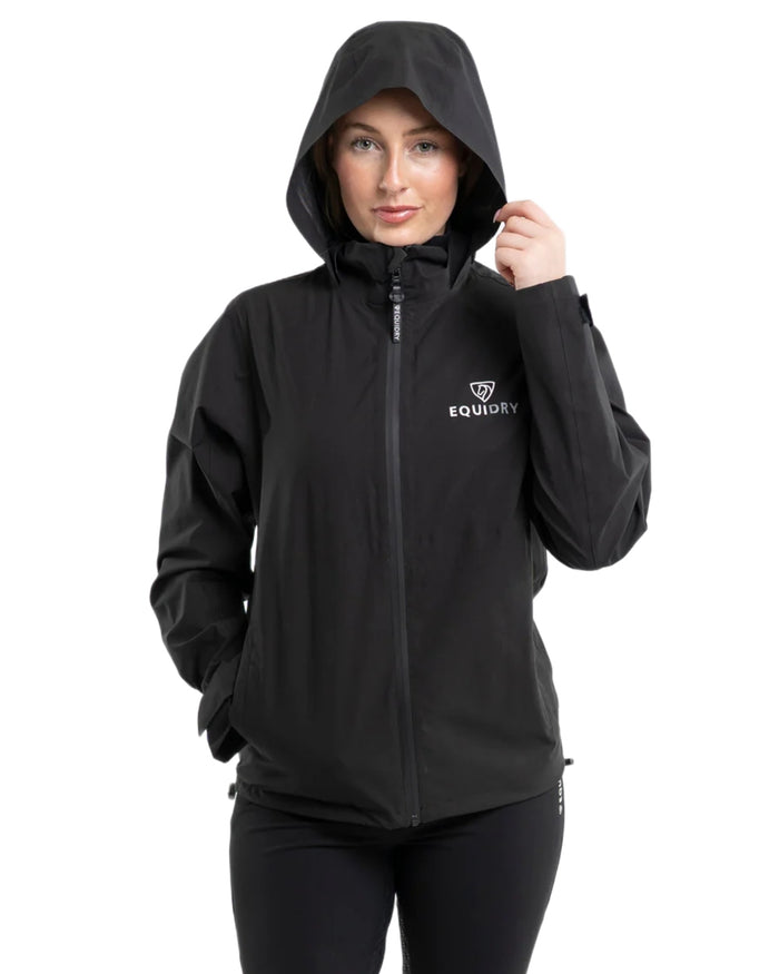 Black coloured Equidry Womens Nimbus Pack Away Jacket with Stowaway Hood on white background #colour_black