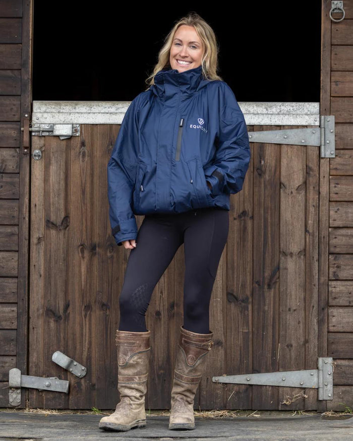 Navy coloured Equidry Womens Shortie Thin Fleece Jacket With Stowaway Hood on outdoor background #colour_navy