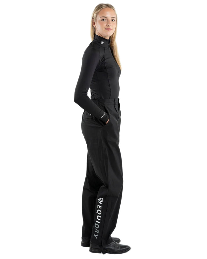 Black coloured Equidry Womens Unlined Waterproof Trousers on white background #colour_black