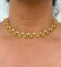 Gold necklace with clover-shaped pendants