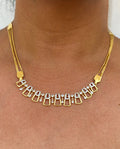 Gold necklace with diamond-like stones
