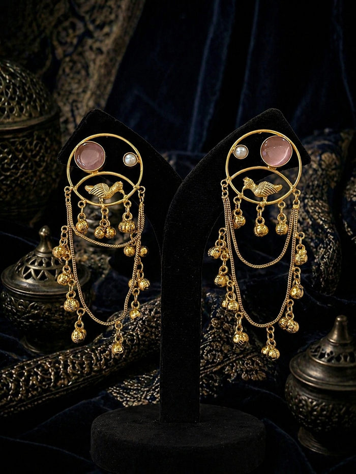 Gold earrings with dangling elements