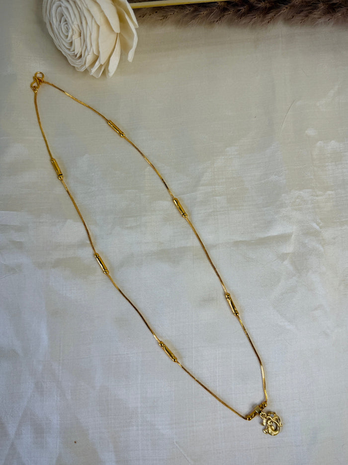 Golden Om ॐ Ganesha Pendant With Tube Station Chain