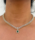 Necklace with a green gemstone pendant