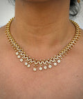 gold neklace with white stone
