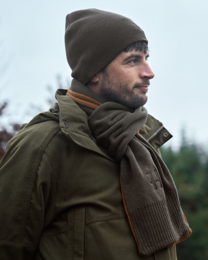 Shadow Brown Rustique Clay Coloured Harkila Reversible Beanie on outdoor background #colour_shadow-brown-rustique-clay