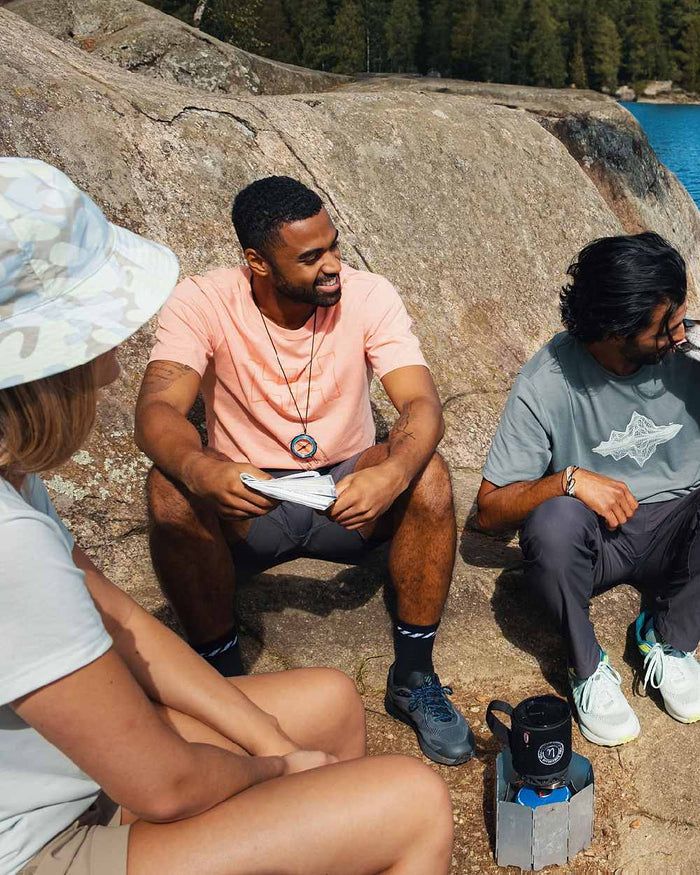 Ebony coloured Helly Hansen Mens Holmen 5 Pocket Shorts on coastal background #colour_ebony