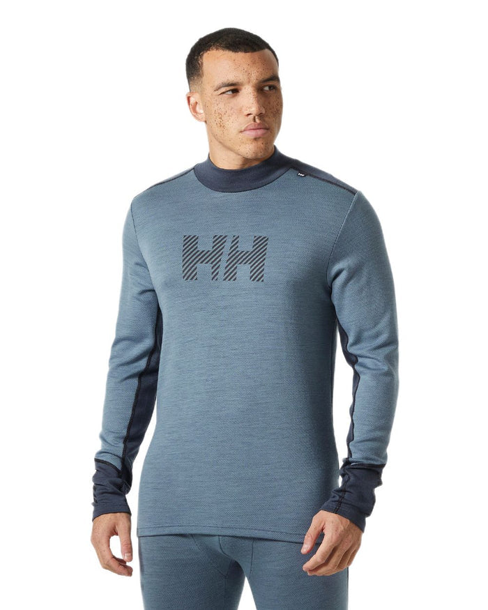 Washed Navy Coloured Helly Hansen Mens Lifa Merino Midweight Logo Base Layer on white background #colour_washed-navy