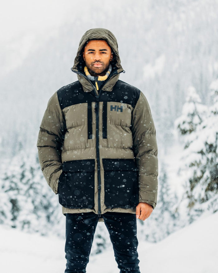 Utility Green Coloured Helly Hansen Mens Patrol Puffy Jacket on snow background #colour_utility-green