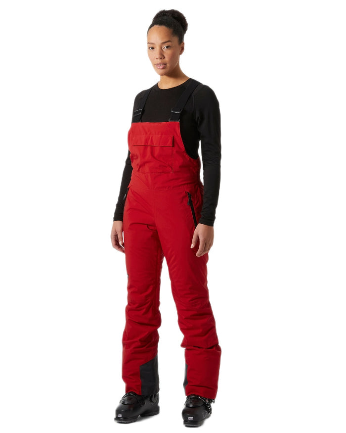 Red Coloured Helly Hansen Womens Legendary Insulated Bib Pants on white background #colour_red