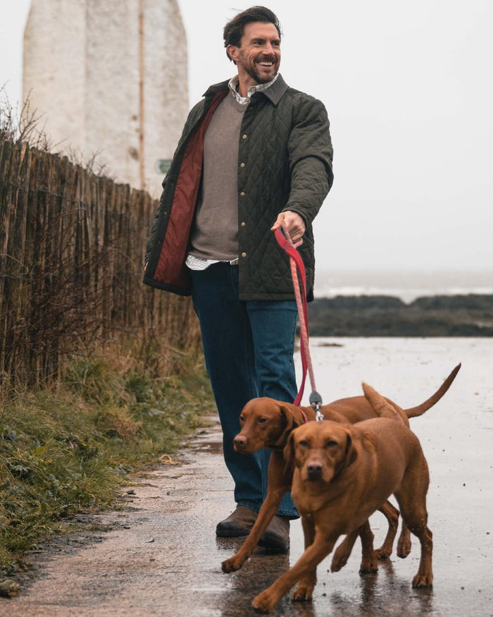 Forest Green Coloured Hoggs of Fife Mens Lochore Quilted Jacket on outdoor background #colour_forest-green