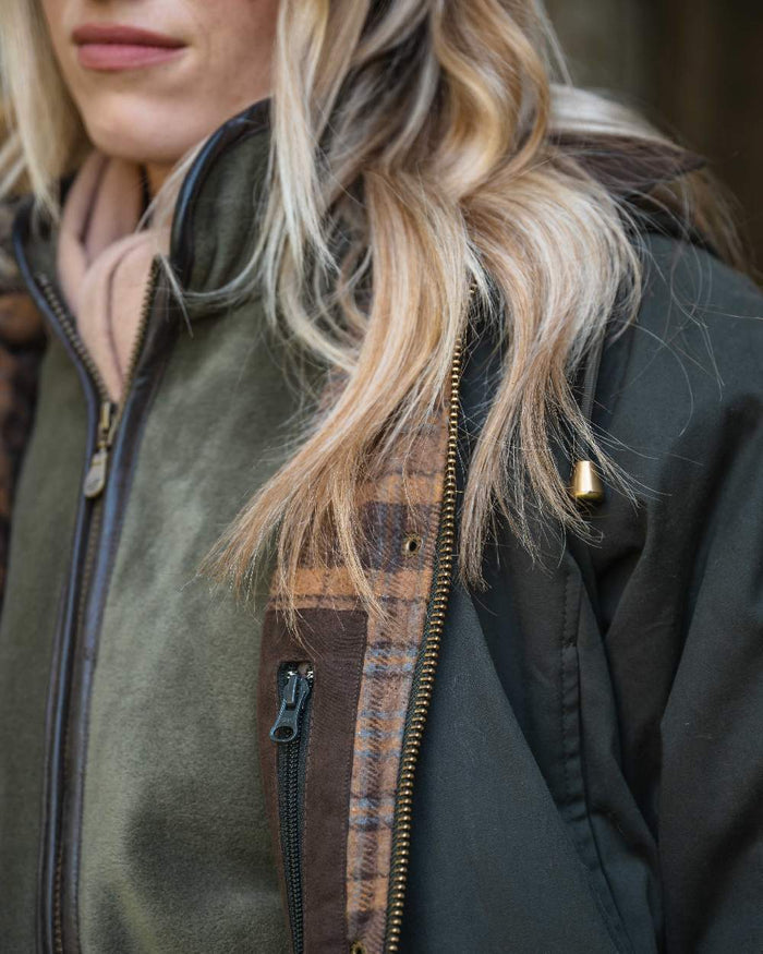 Forest Green Coloured Hoggs of Fife Womens Kelso Waterproof Waxed Jacket on outdoor background #colour_forest-green