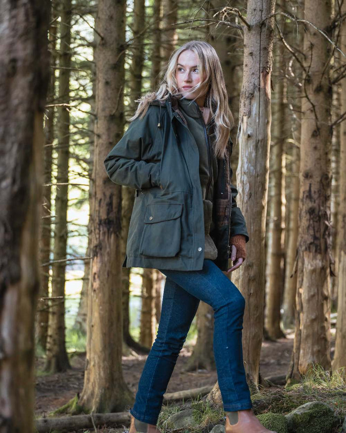 Forest Green Coloured Hoggs of Fife Womens Kelso Waterproof Waxed Jacket on outdoor background #colour_forest-green