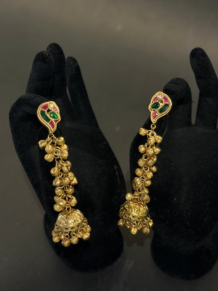 Gold earrings with green and red stones
