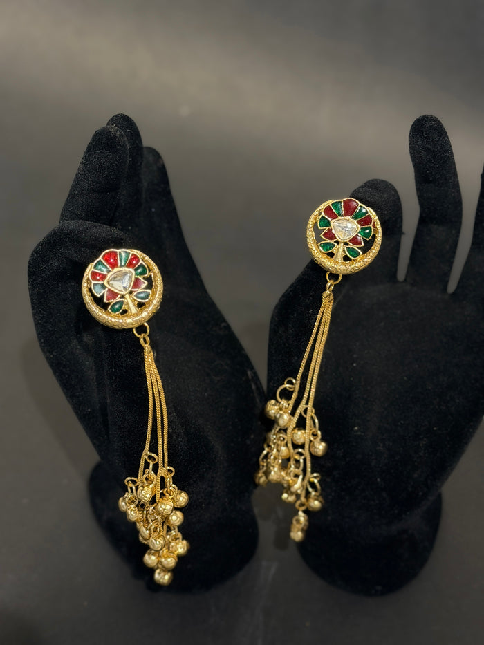Gold earrings with gemstones