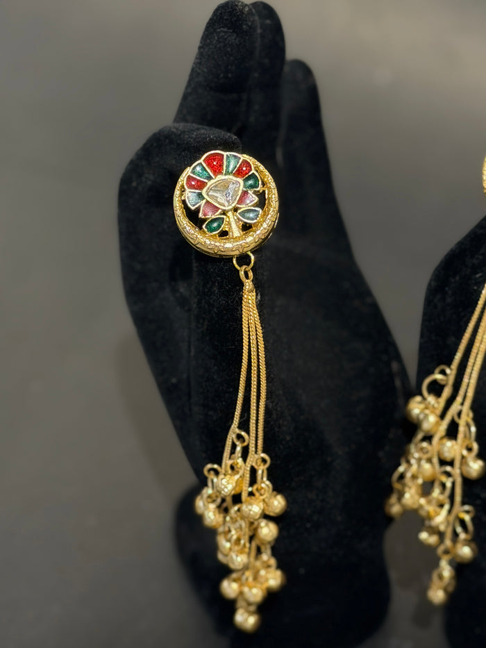 Gold earrings with colorful gemstones