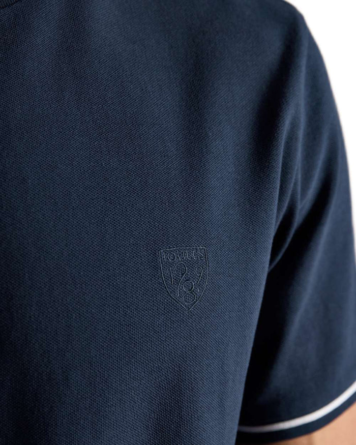 Navy coloured Joules Mens Classic Fit Cotton Pique T-Shirt on white background #colour_navy