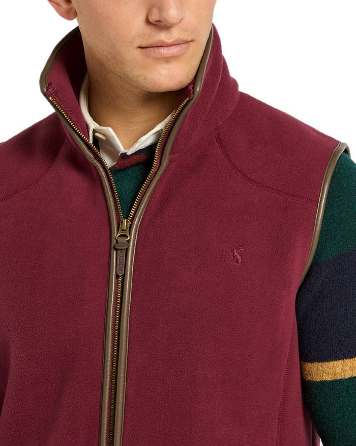 Burgundy Red Coloured Joules Mens Heritage Fleece Gilet on white background #colour_burgundy-red