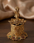 Krishna Flute On Lotus Lid Filigree Floral Cylinder Kumkum Box