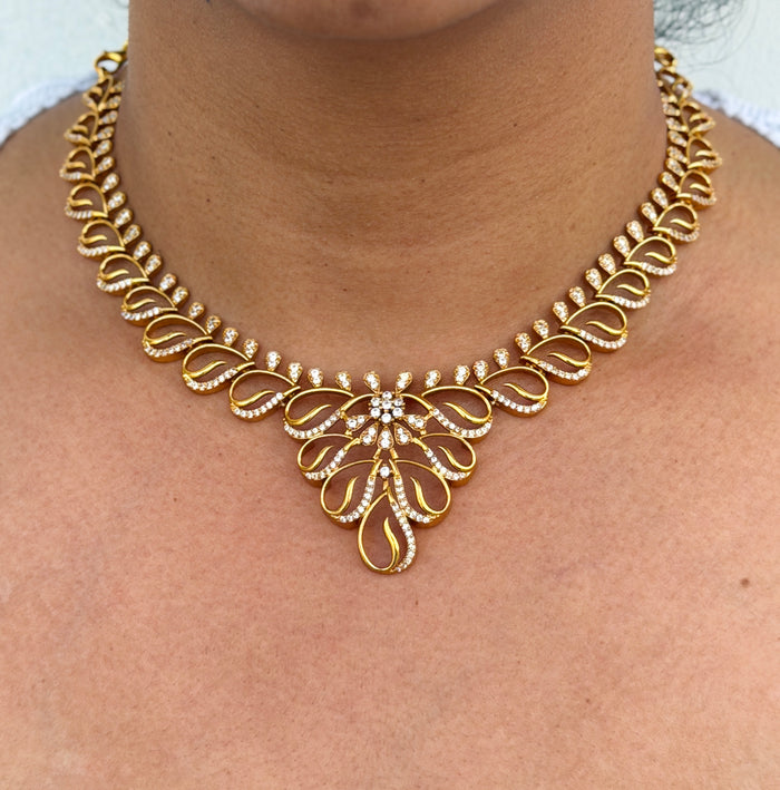 Gold necklace with intricate design