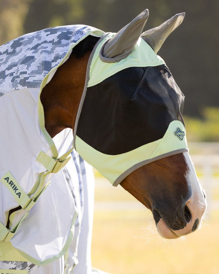 Macaron coloured LeMieux Visor-Tek Half Fly Mask on outdoor background #colour_macaron