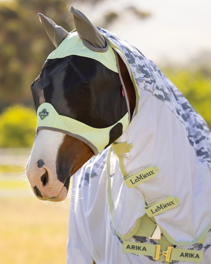 Macaron coloured LeMieux Visor-Tek Half Fly Mask on outdoor background #colour_macaron