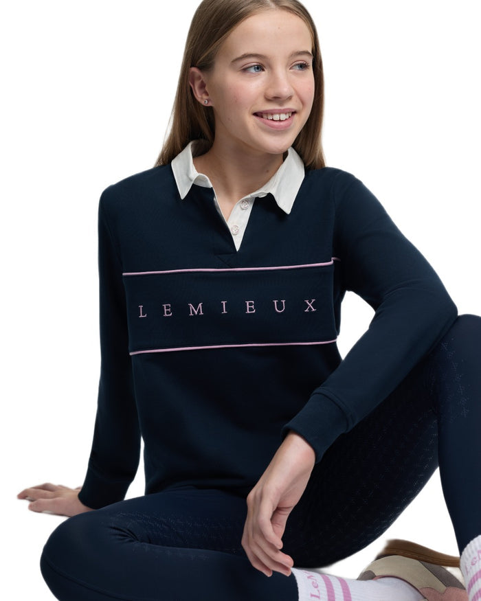 Navy coloured LeMieux Young Rider Riley Rugby Shirt on white background #colour_navy