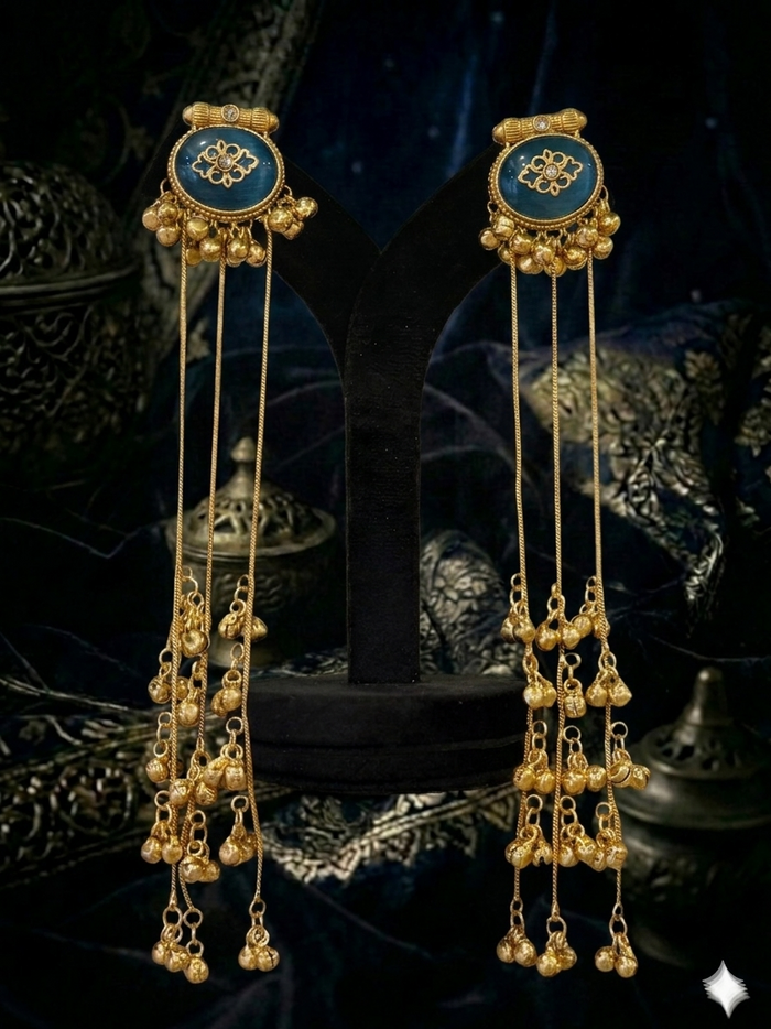 gold earrings with blue gemstones