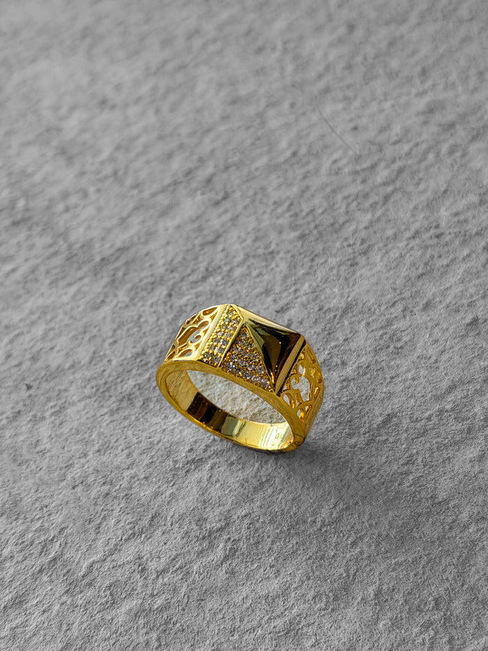 Gold ring with intricate design