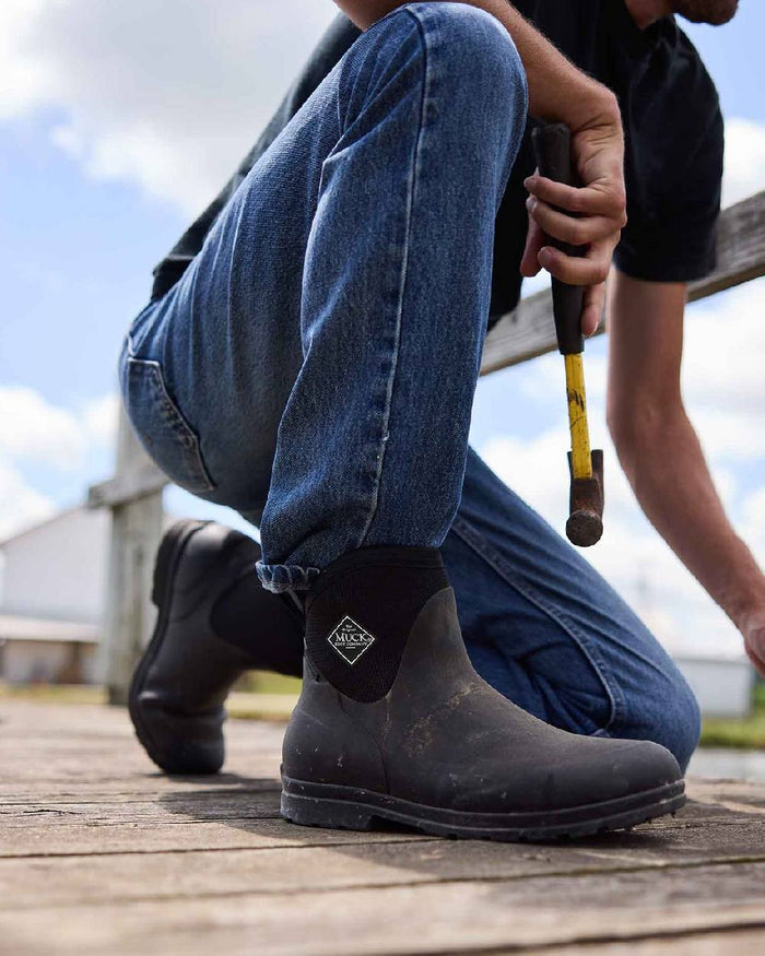 Black Coloured Muck Boots Mens Originals Excursion Ankle Boots on Outdoor Background
#colour_black