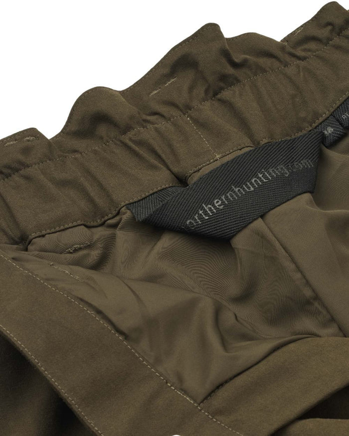 Dark Green coloured Northern Hunting Womens Alva Una G2 Hunting Trousers on white background #colour_dark-green