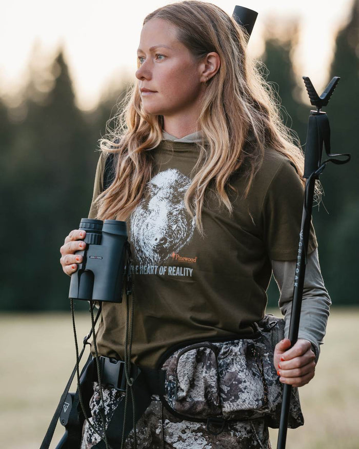 Hunter Olive coloured Pinewood Womens Wild Boar T-Shirt on blurry background #colour_hunter-olive