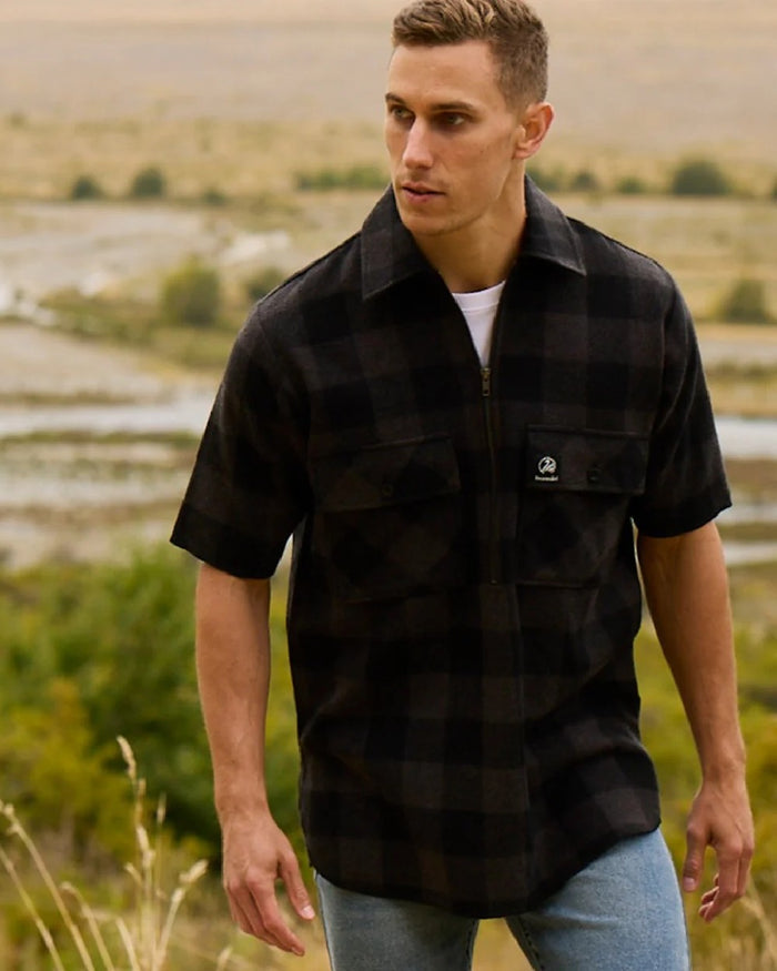 Grey Black Check Coloured Swanndri Mens Henderson Wool Jacket on outdoor background #colour_grey-black-check