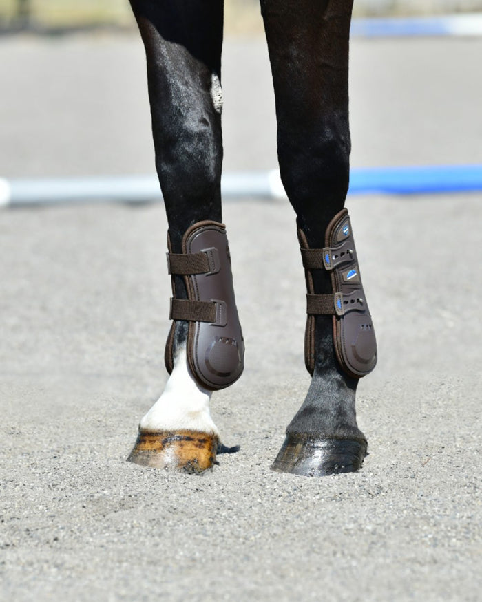 Brown Coloured WeatherBeeta Tough-Tec Essential Open Front Boots on horse background #colour_brown