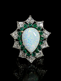 Opal ring with emeralds and diamonds